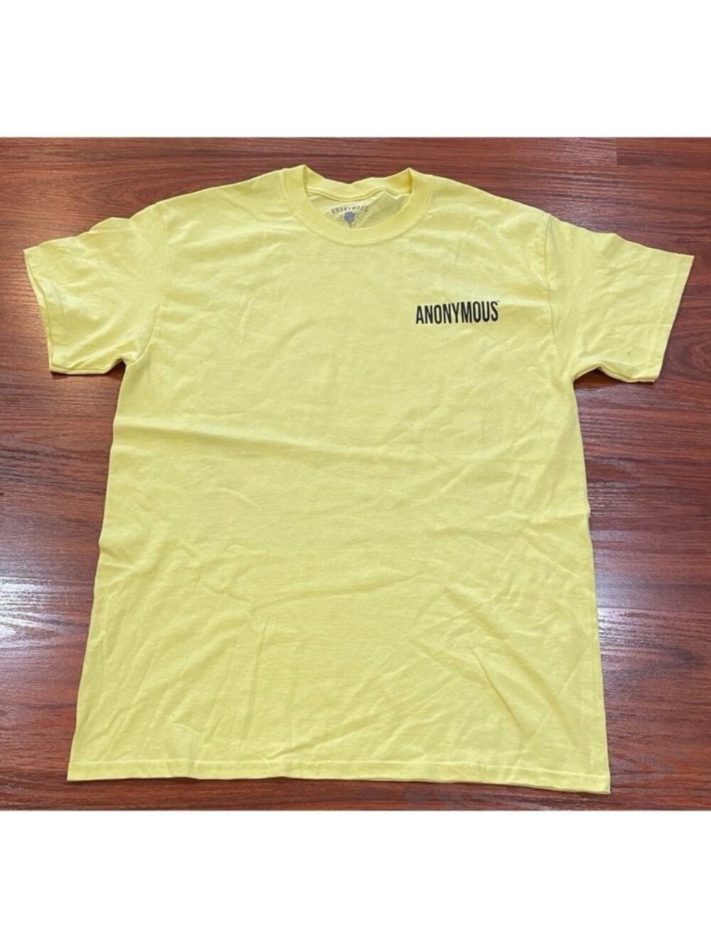 ANONYMOUS YELLOW SHIRT SIZE MEDIUM